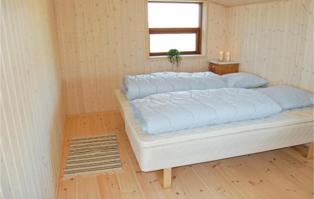 Postel nebo postele na pokoji v ubytování Holiday Home Tingodden Ix