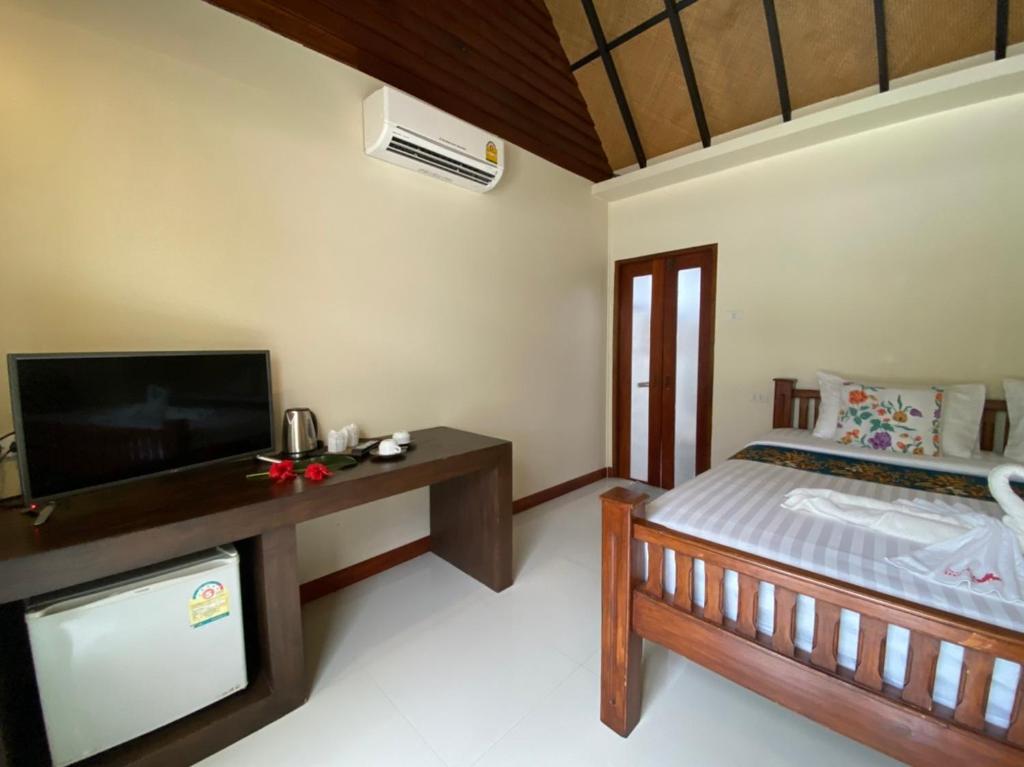 Postel nebo postele na pokoji v ubytování Chunut House Resort