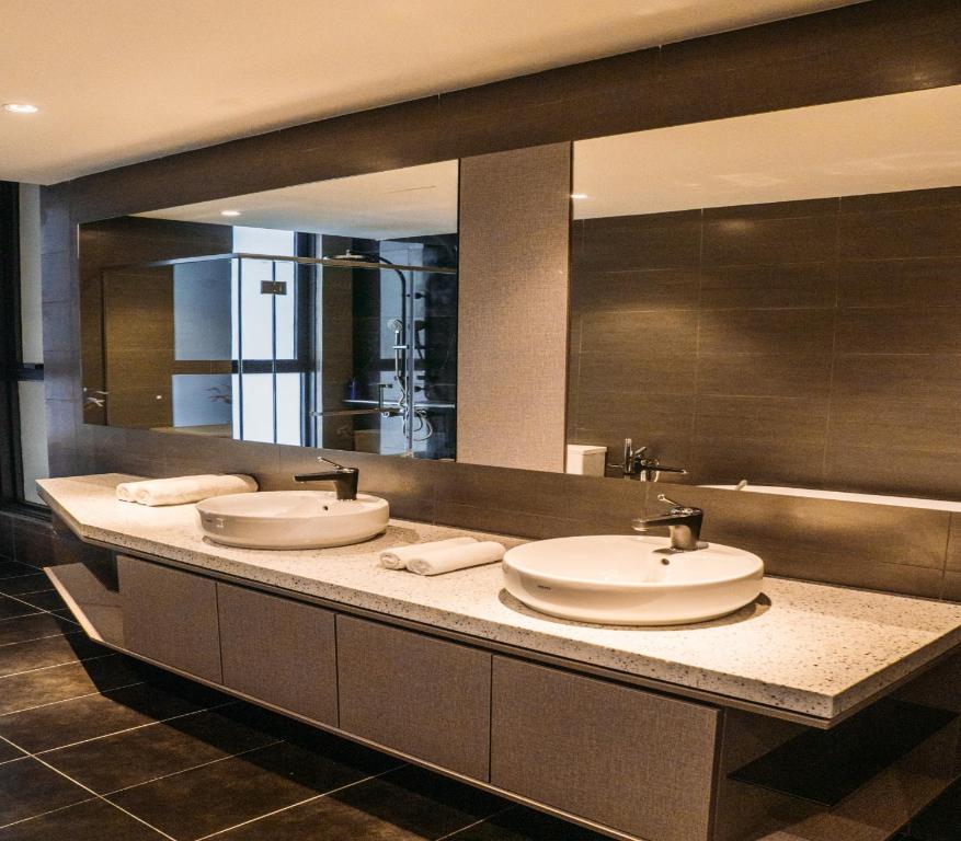 Koupelna v ubytování Expressionz Suites By iHost Global