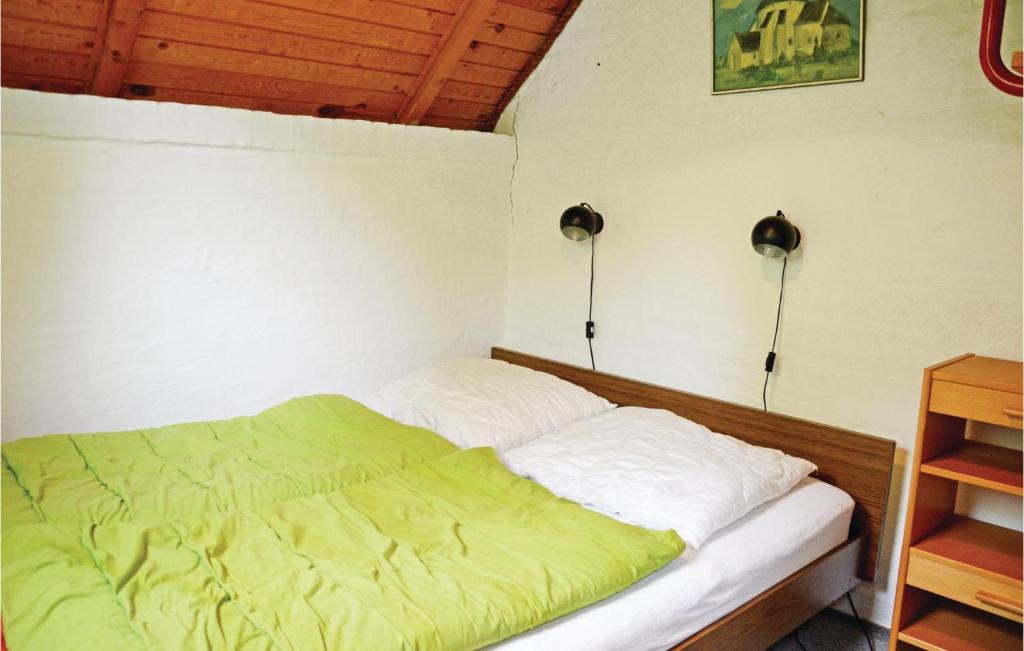 Postel nebo postele na pokoji v ubytování Humlebo