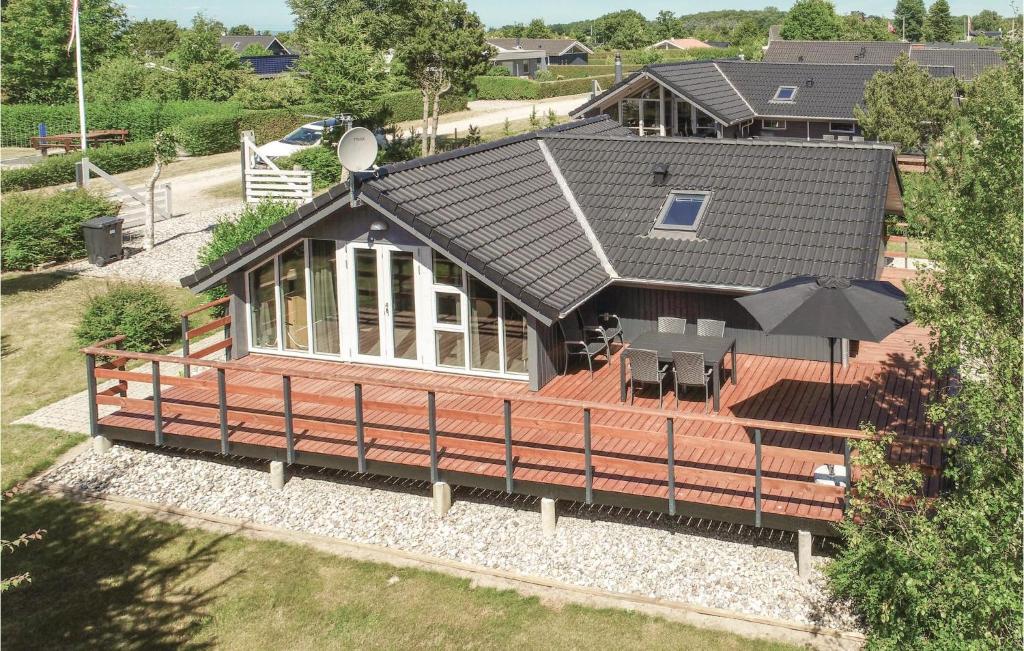 an overhead view of a house with a roof at Awesome Home In Bogense With 3 Bedrooms And Wifi in Bogense