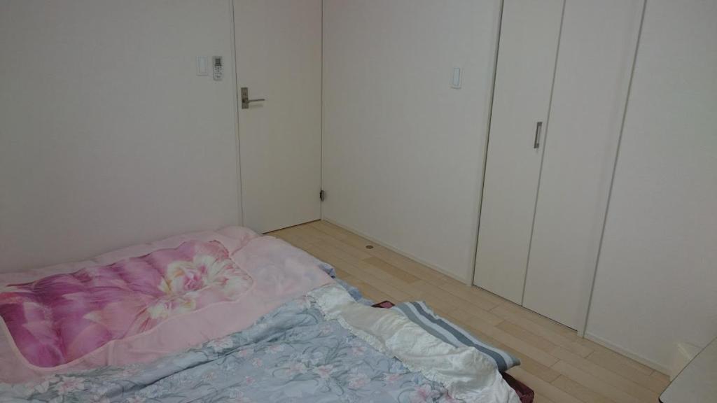 Postel nebo postele na pokoji v ubytování バイキング樫本