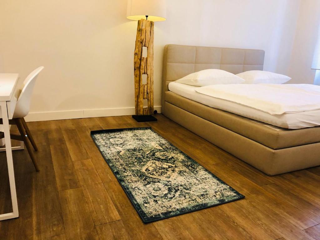 Postel nebo postele na pokoji v ubytování Jasper's Boutique Hotel