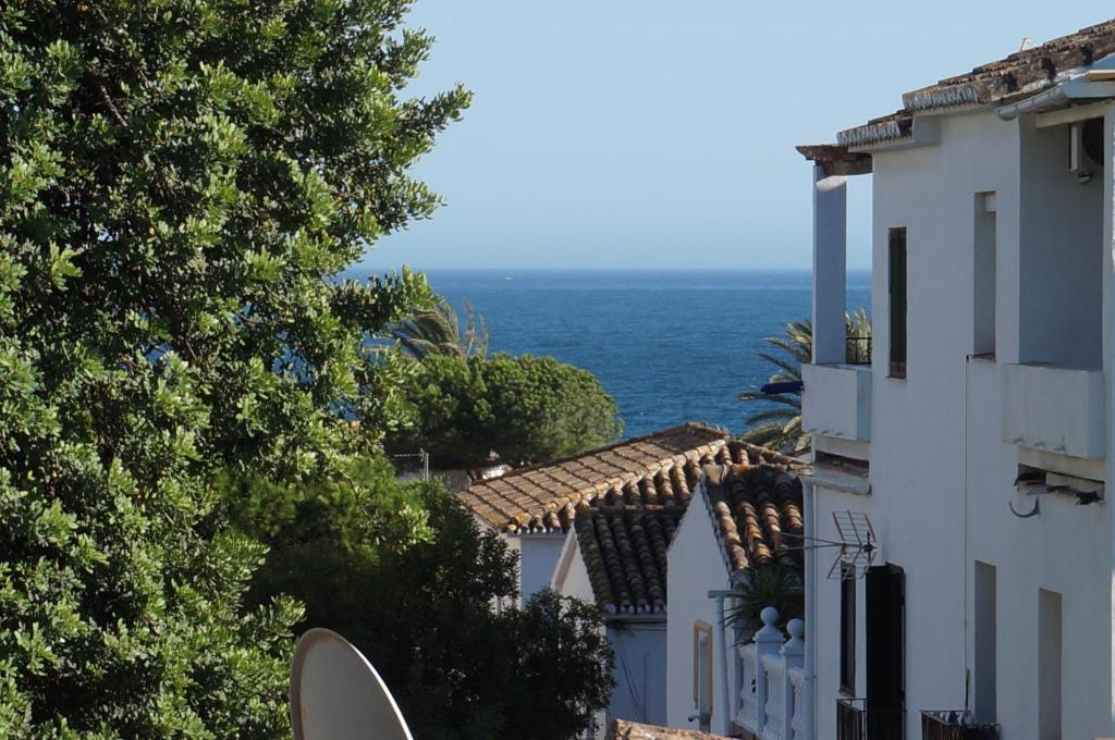 a view of the ocean from a building at La Cala sunny rooftop in Mijas Costa