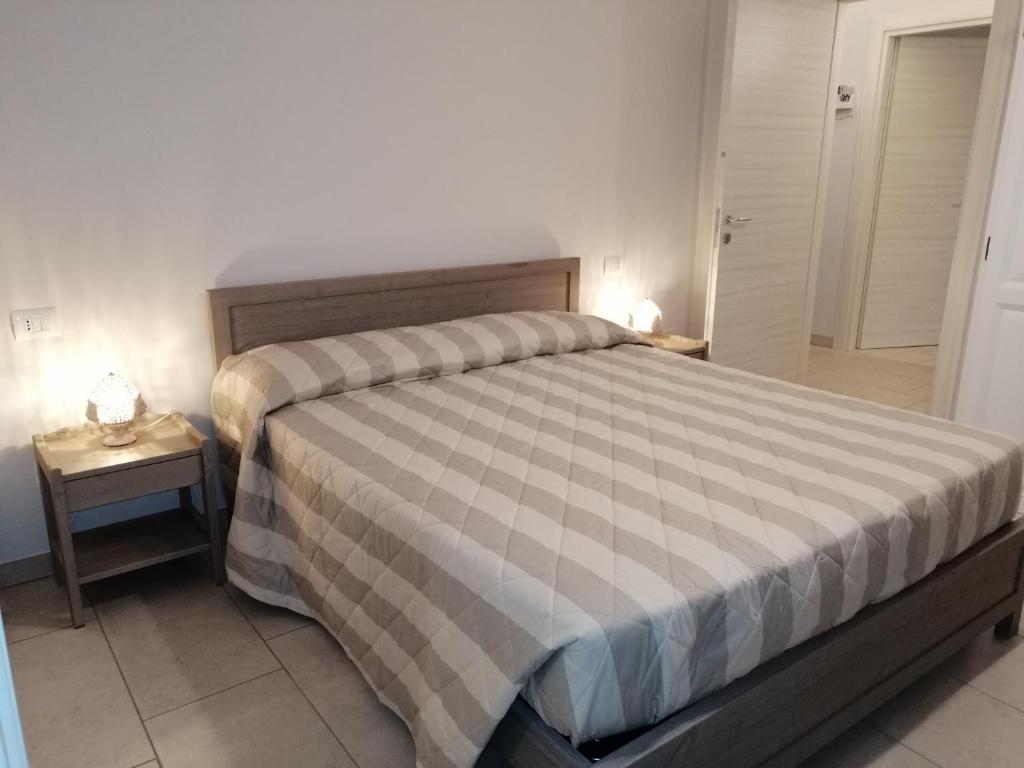 A bed or beds in a room at Terra Mater - Exclusive Cottage -