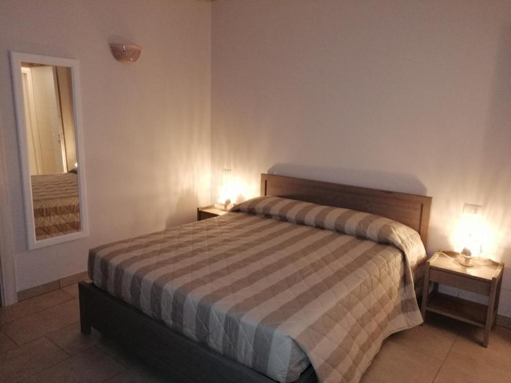 A bed or beds in a room at Terra Mater - Exclusive Cottage -