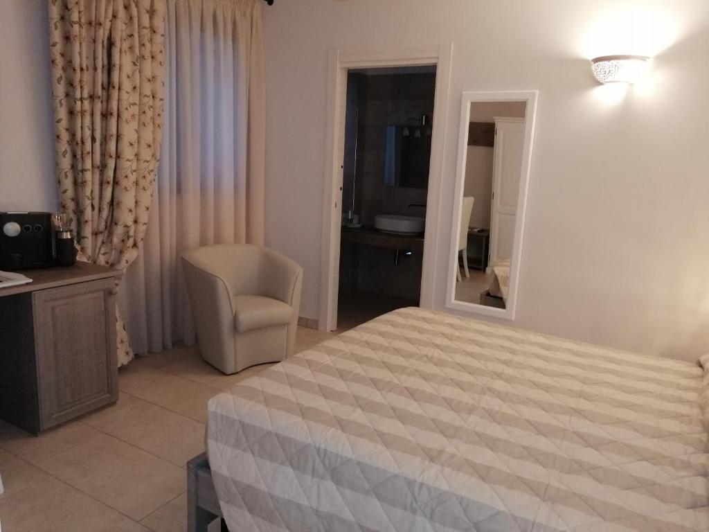 A bed or beds in a room at Terra Mater - Exclusive Cottage -