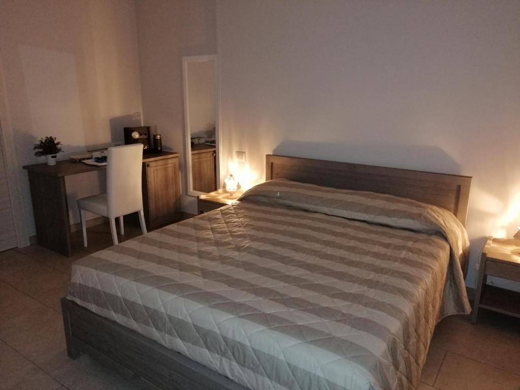 A bed or beds in a room at Terra Mater - Exclusive Cottage -
