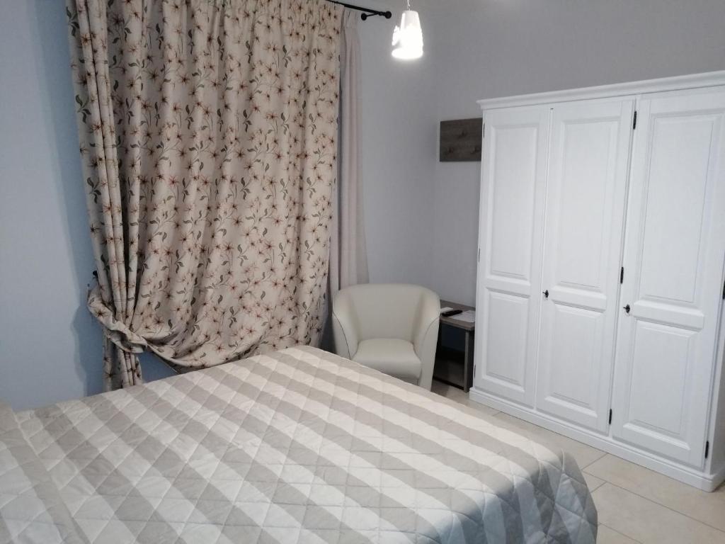 A bed or beds in a room at Terra Mater - Exclusive Cottage -
