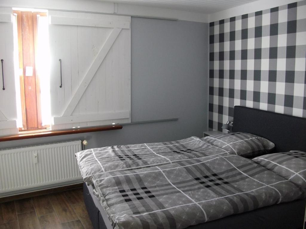 Postel nebo postele na pokoji v ubytování moij Stuuv