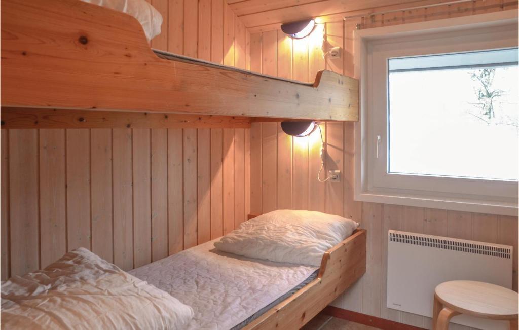 Postel nebo postele na pokoji v ubytování Holiday Home Blomstervangen Ix