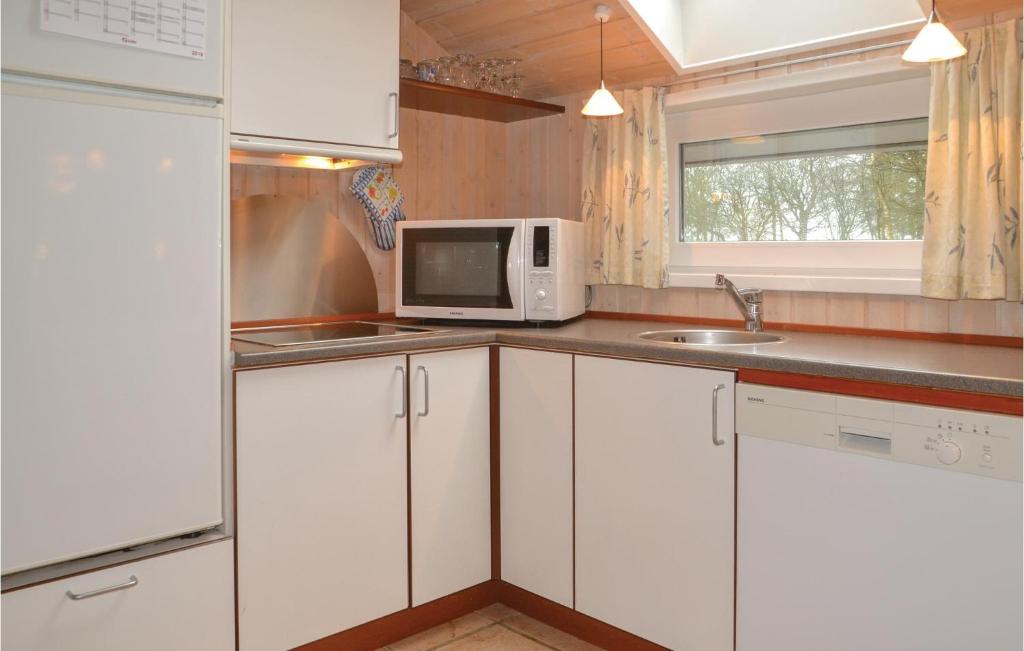 Kuchyň nebo kuchyňský kout v ubytování Holiday Home Blomstervangen Ix