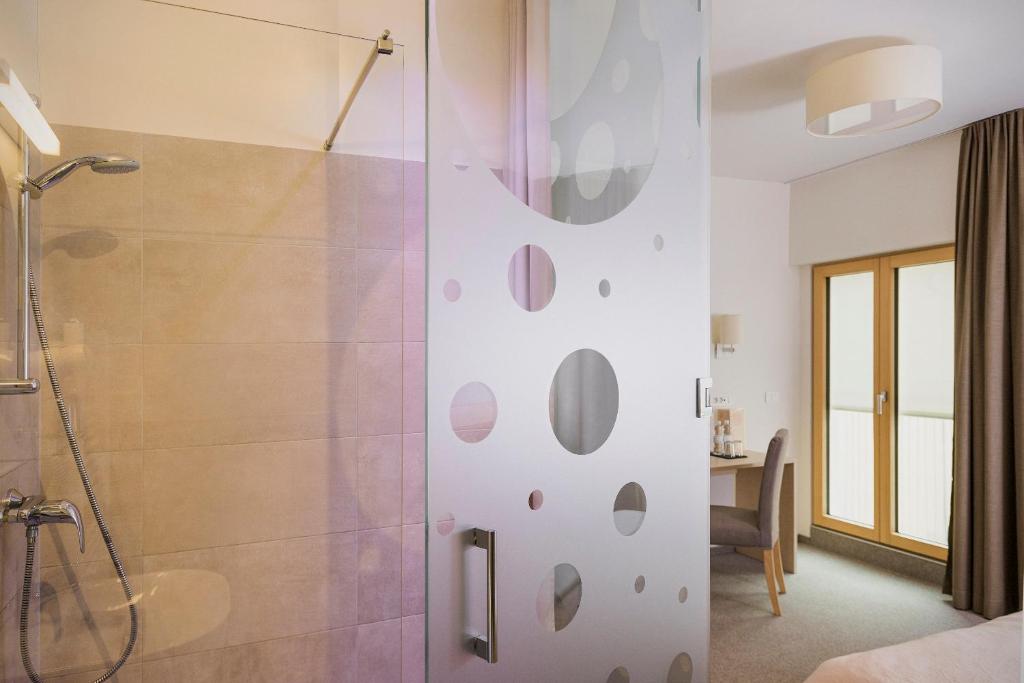 Koupelna v ubytování Art Hotel