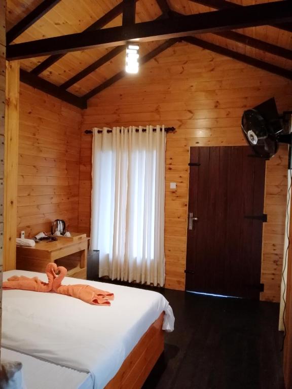Postel nebo postele na pokoji v ubytování The Cabin Ella