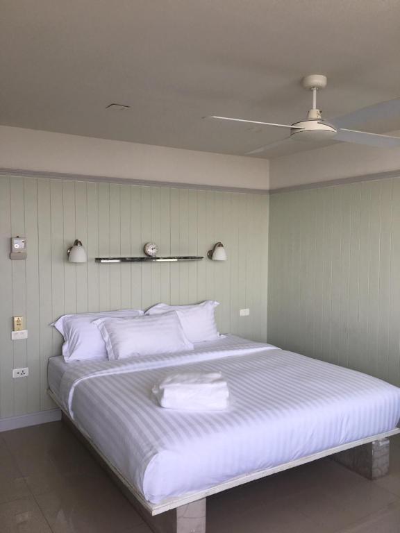 Postel nebo postele na pokoji v ubytování PierView Rooms