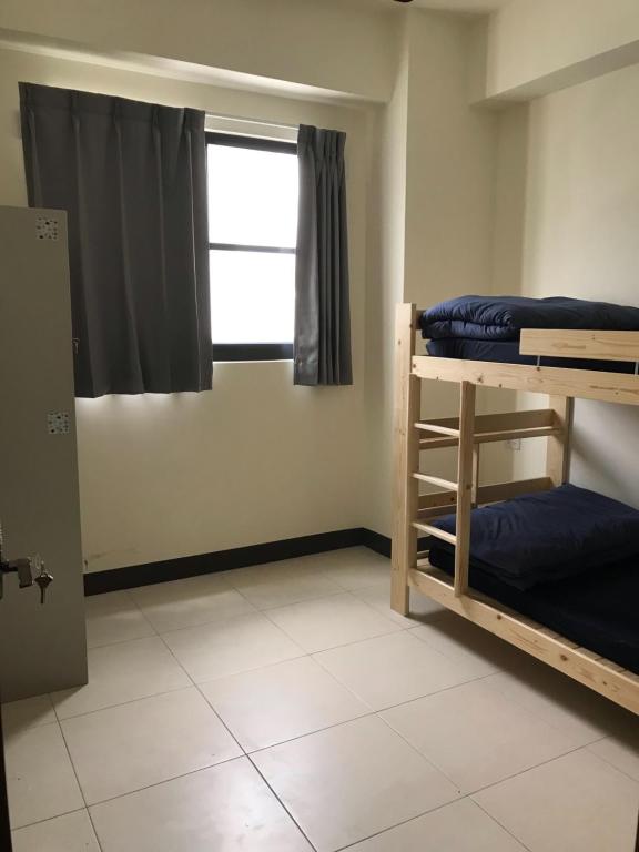 Postel nebo postele na pokoji v ubytování Sam-Lin Hostel