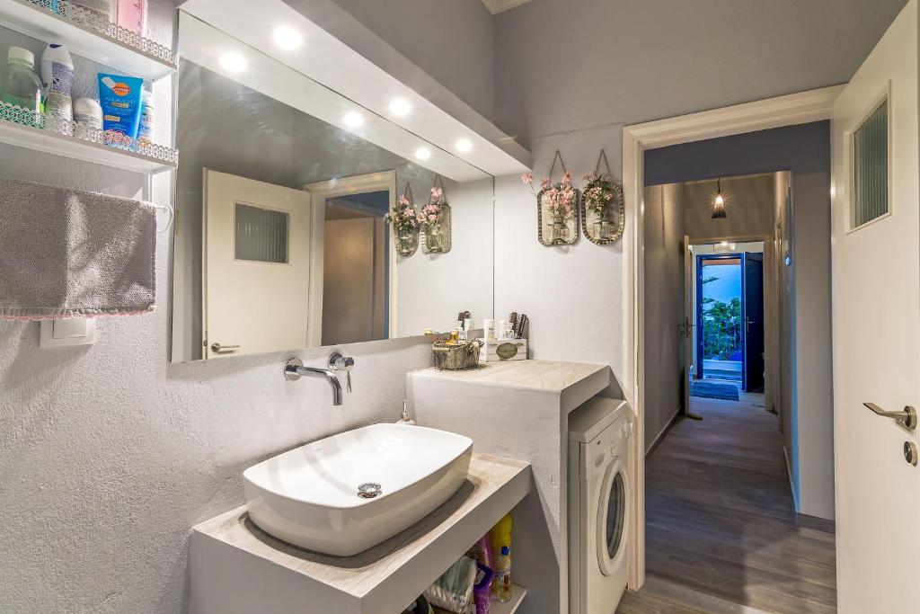 A bathroom at Villa Myrina with Sea View BY APOKORONAS-VILLAS