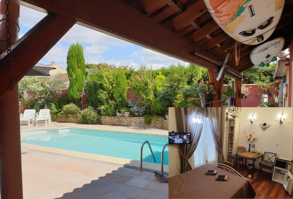 a house with a swimming pool and a tv at REDHOUSE Chambre zen in Roques Sur Garonne