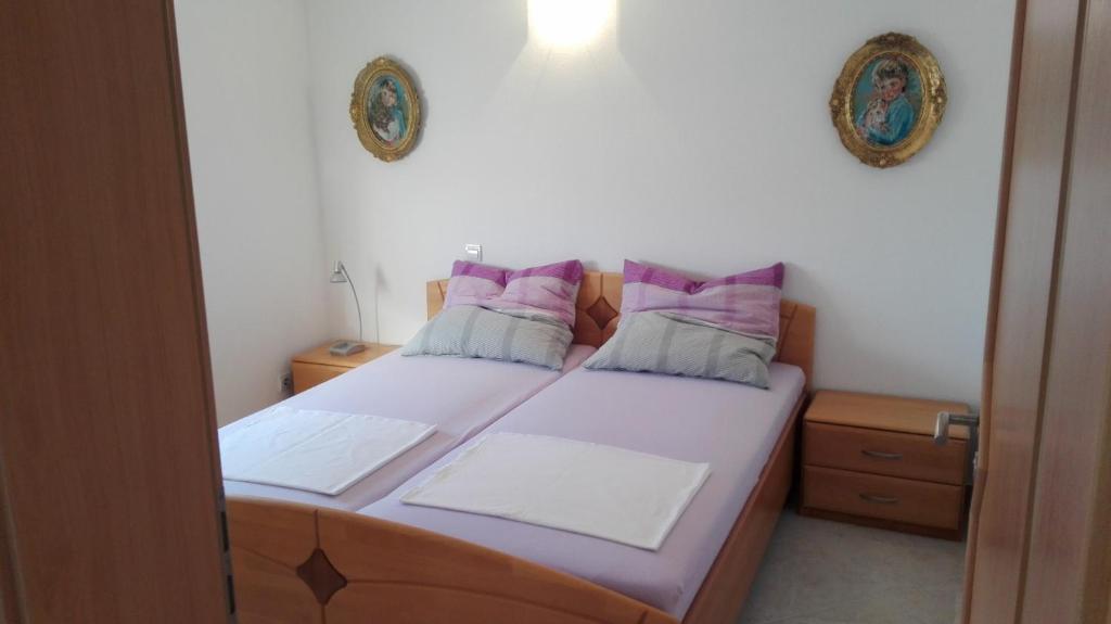 Postelja oz. postelje v sobi nastanitve Apartments Marko Sutivan Insel Brać