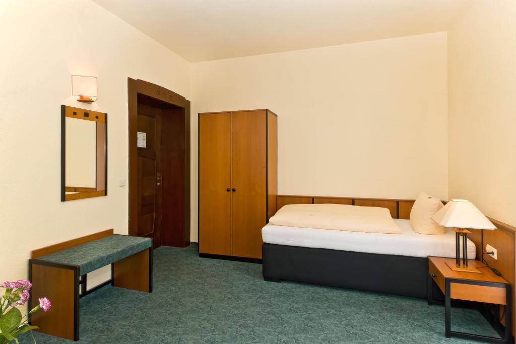 Postel nebo postele na pokoji v ubytování Hotel Katharinenhof