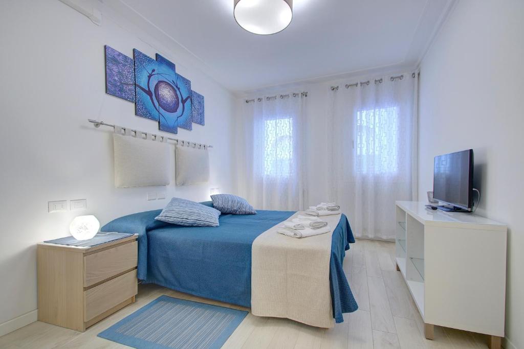 Llit o llits en una habitació de RECIOTO Rialto-Market