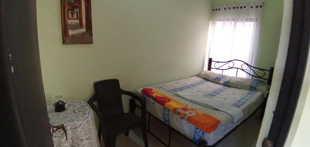 Postel nebo postele na pokoji v ubytování Hospedaje Alto de San Luis - Vivienda Turística RNT-90280