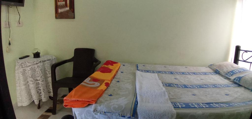 Postel nebo postele na pokoji v ubytování Hospedaje Alto de San Luis - Vivienda Turística RNT-90280