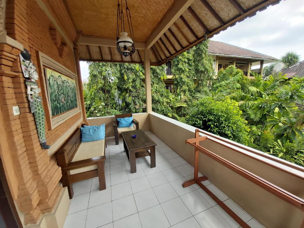 Balkón nebo terasa v ubytování Cafe Wayan Cottages Senggigi