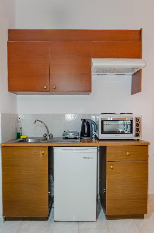 A kitchen or kitchenette at Amaradios