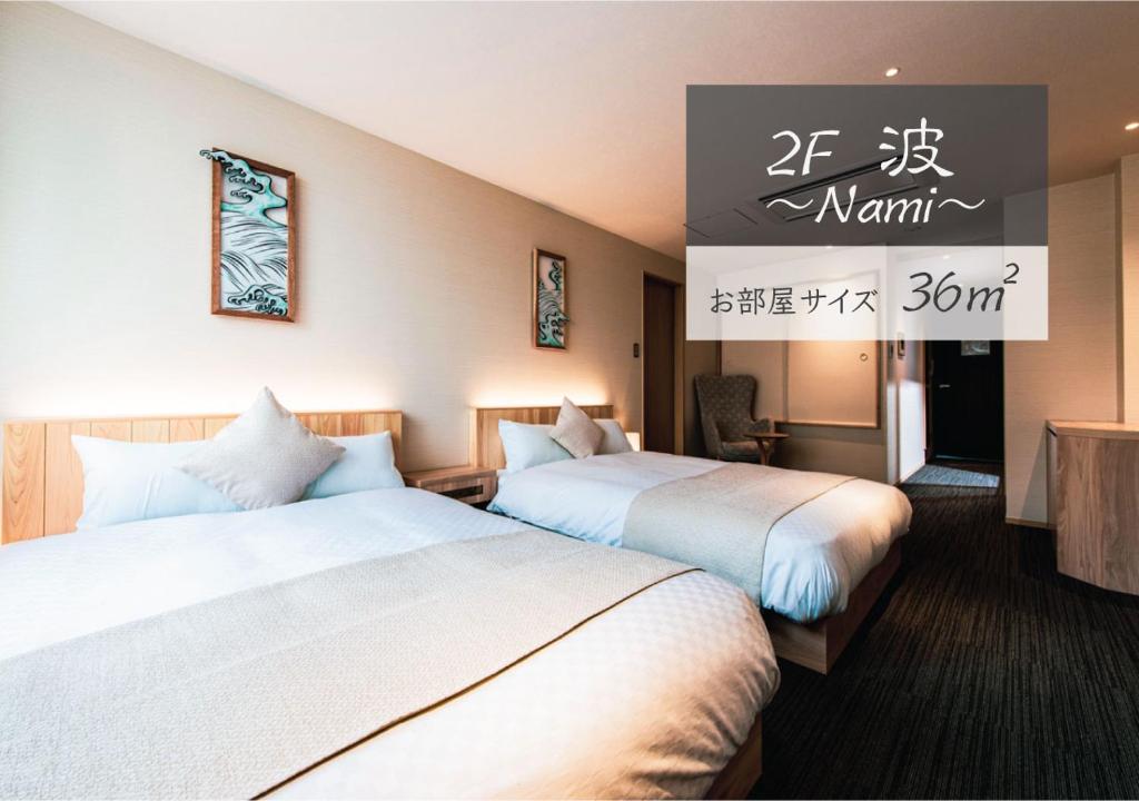 Postel nebo postele na pokoji v ubytování Hotel ZIZI Kyoto Gion