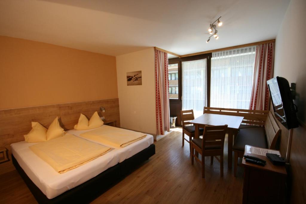 Postel nebo postele na pokoji v ubytování Appartements Domizil