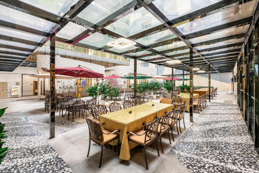 Restaurace v ubytování Golden Central Hotel Serviced Residence-Xin Hao E Du金中环服务公寓新浩e都店