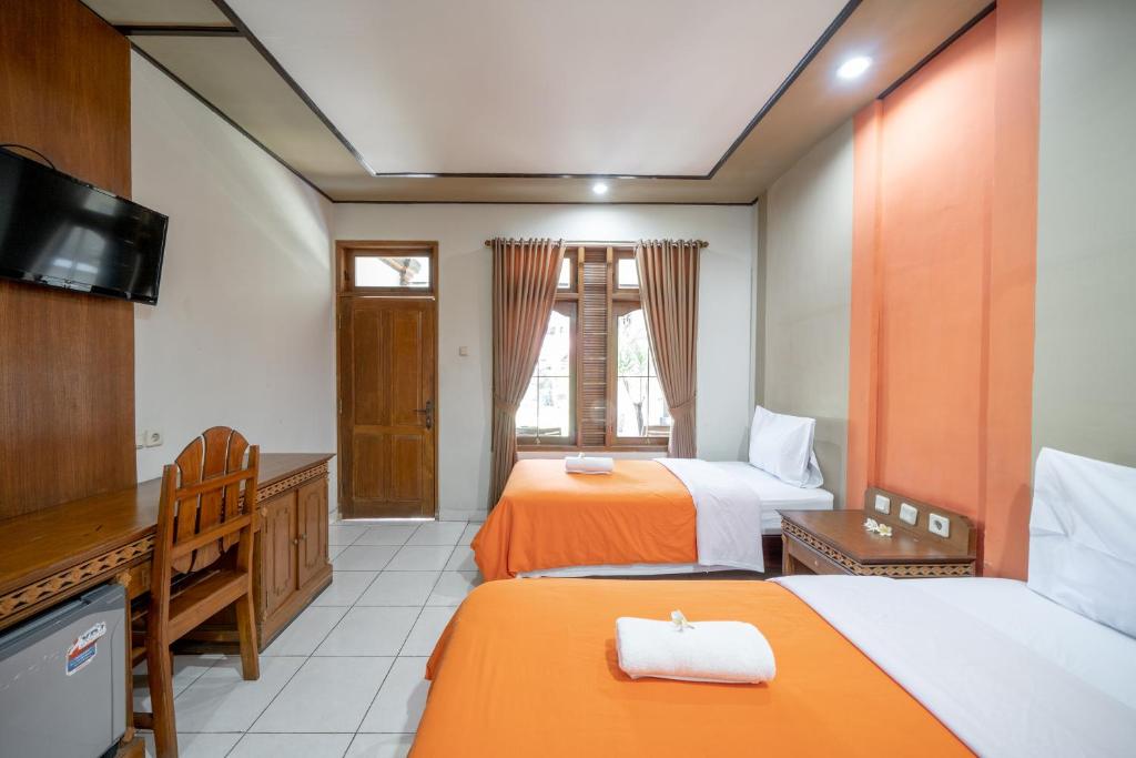 Postel nebo postele na pokoji v ubytování Bendesa Accommodation