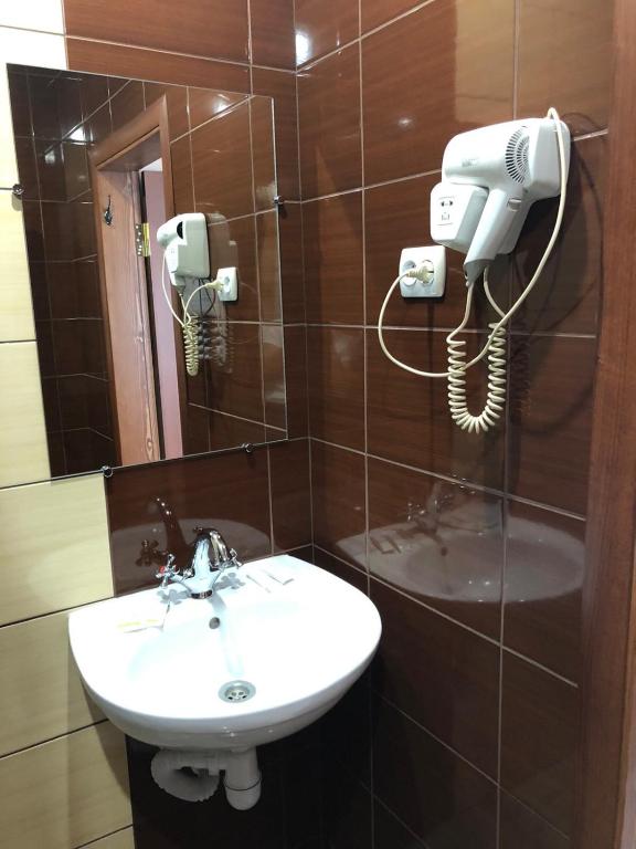 Koupelna v ubytování Kontinent Hotel