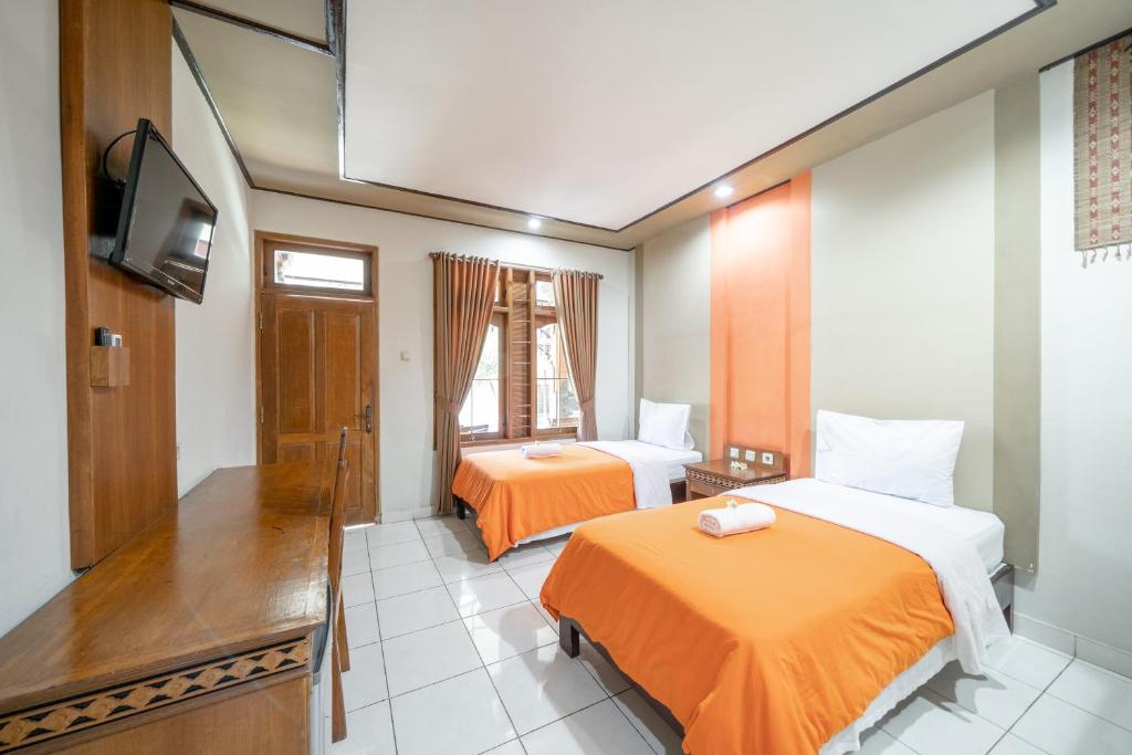 Postel nebo postele na pokoji v ubytování Bendesa Accommodation
