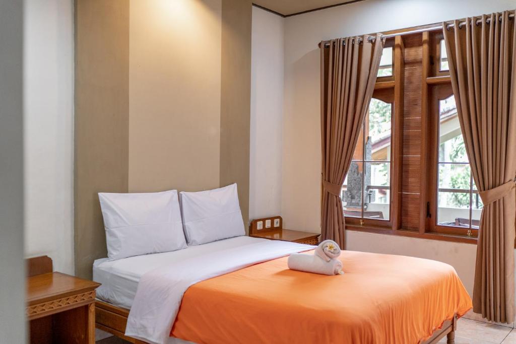 Postel nebo postele na pokoji v ubytování Bendesa Accommodation