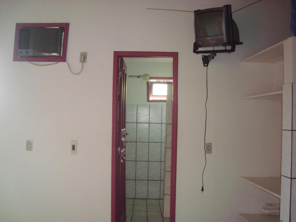 TV a/nebo společenská místnost v ubytování Residencial Ravasco
