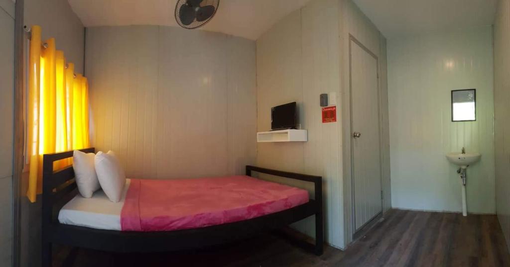 Postel nebo postele na pokoji v ubytování Dormitelsph Cloud 9