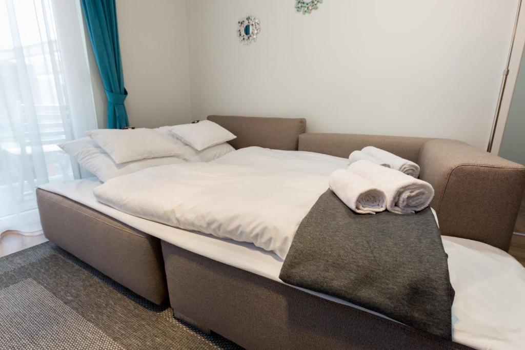 Posteľ alebo postele v izbe v ubytovaní BUDAPEST DOWNTOWN Residences - AC,ELEVATOR,TERRACE