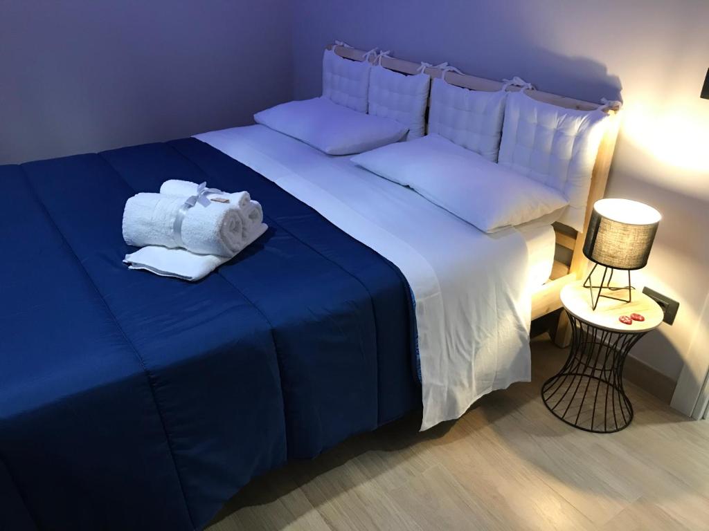 Posteľ alebo postele v izbe v ubytovaní Il Tempio di Athena - Cultura e Relax a Siracusa