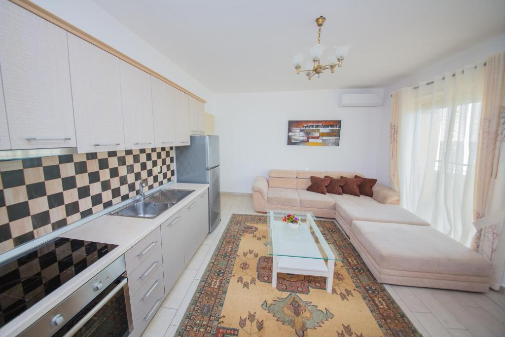 Kuchyň nebo kuchyňský kout v ubytování Apartments Qerret