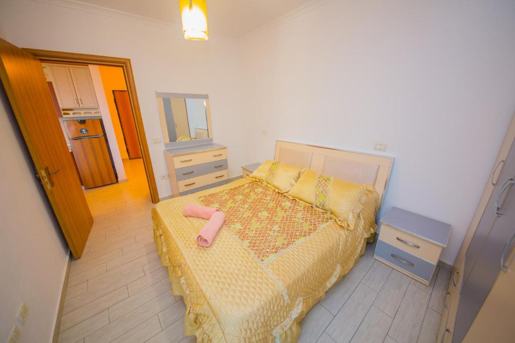 Postel nebo postele na pokoji v ubytování Apartments Qerret