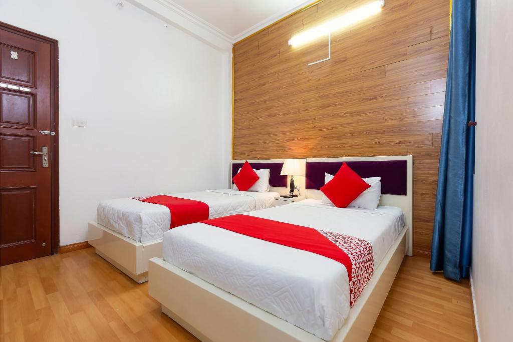 Postel nebo postele na pokoji v ubytování Little Hanoi Hostel