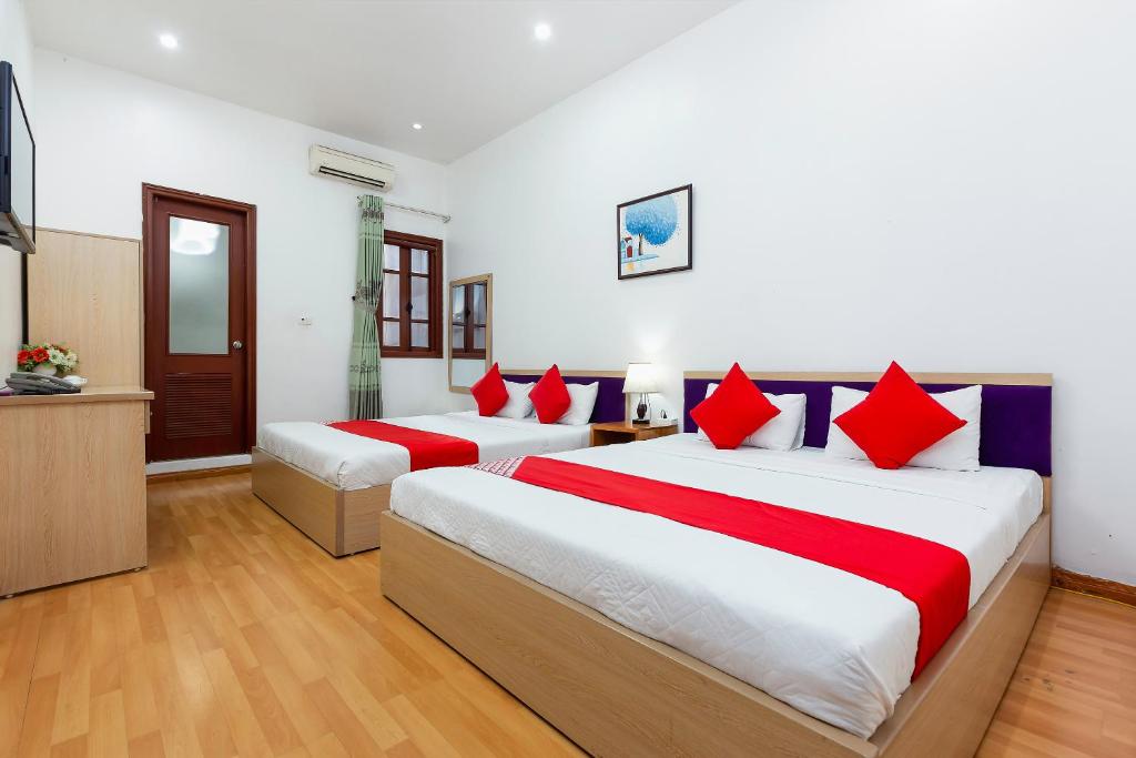 Postel nebo postele na pokoji v ubytování Little Hanoi Hostel