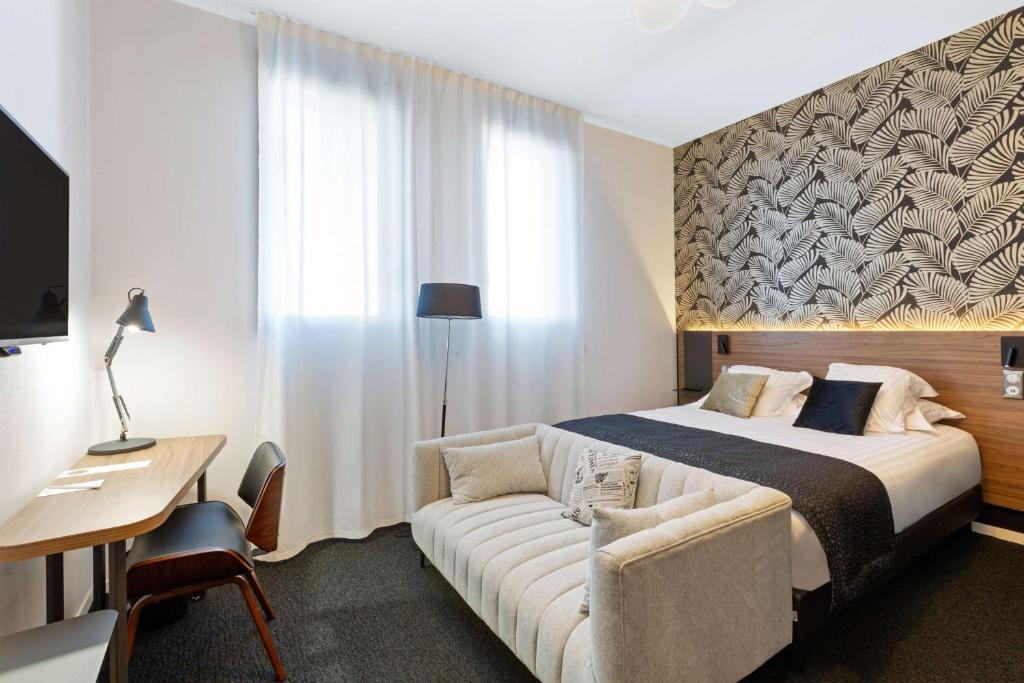 Postel nebo postele na pokoji v ubytování Best Western Plus Europe Hôtel Brest