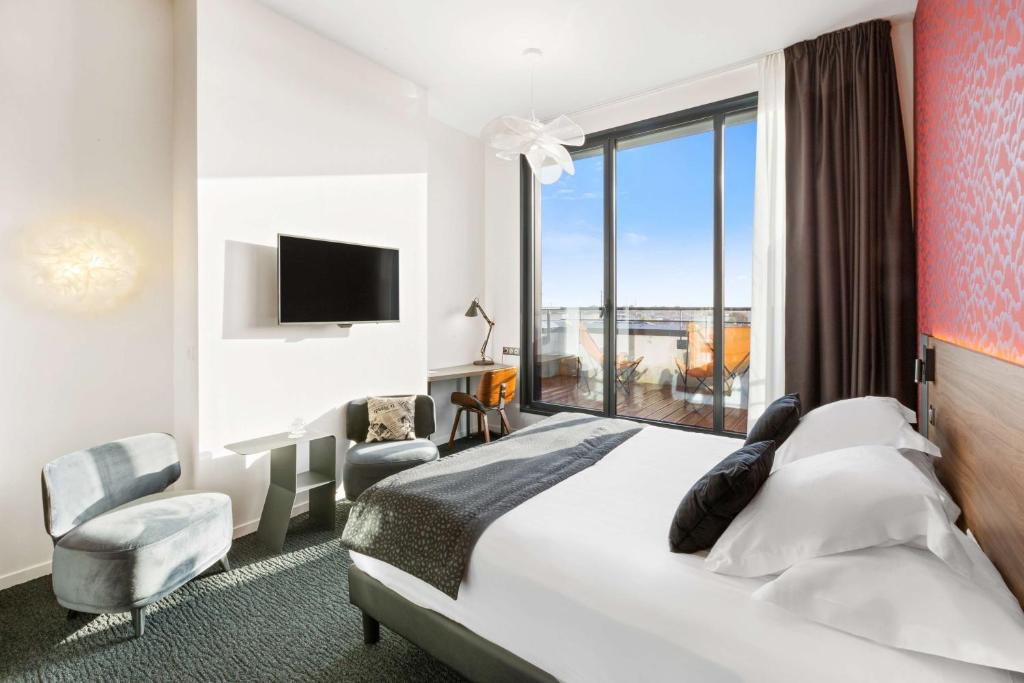 Postel nebo postele na pokoji v ubytování Best Western Plus Europe Hôtel Brest