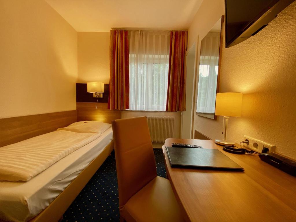 Tempat tidur dalam kamar di Römerhof