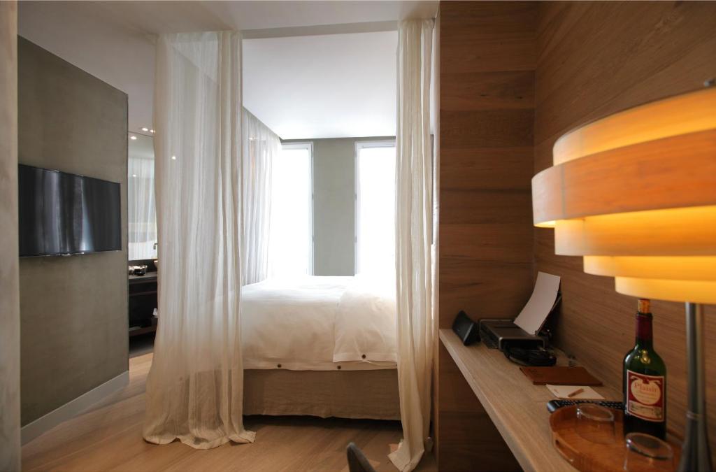 TV a/nebo společenská místnost v ubytování Hidden Hotel