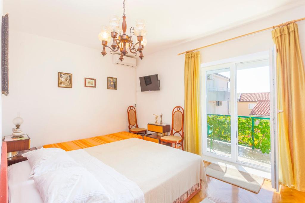 Postel nebo postele na pokoji v ubytování Green garden Rooms & Apartments