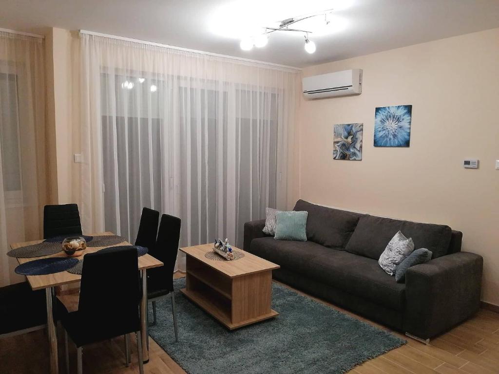 A seating area at Olga Apartman